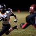 Tecumseh High School senior Spencer Hite runs in for a touchdown in the first quarter against Milan on Friday. Tecumseh leads at halftime 14-6. Daniel Brenner I AnnArbor.com